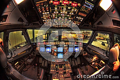 Airbus A330 Cockpit at night Stock Photo