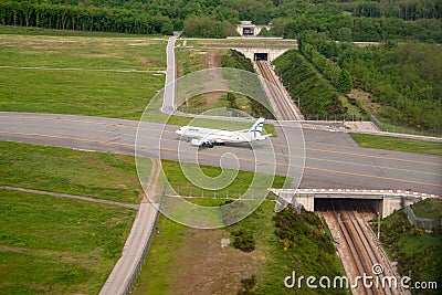 Airbus airliner on the runway on the airport , aerial view ,Airplane transportation. Jet air plane. Modern, concept. Editorial Stock Photo