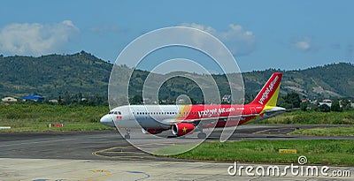 Airbus A320 airplane taxiing on runway Editorial Stock Photo
