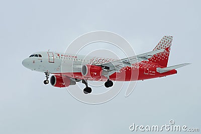 Airbus A319-111 `Ivanovo` VP-BIQ of `Airline Rossiya` airline in the gloomy sky before landing on the Pulkovo airport. Profile v Editorial Stock Photo