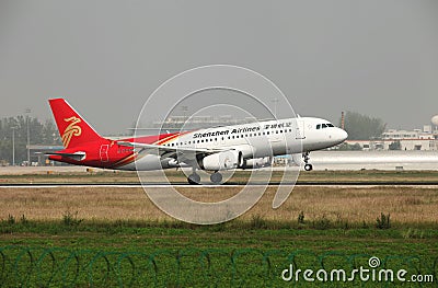 A airbus 320 landing on the runway Editorial Stock Photo