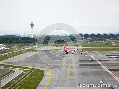 Airbus plane own by airasia towed and ready to take off Editorial Stock Photo