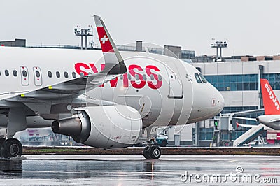 Airbus A320 Swiss Airlines taxis at the Moscow airport Domodedovo Editorial Stock Photo
