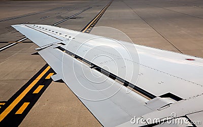 Aircraft airplane left wing on airport soil signs Stock Photo