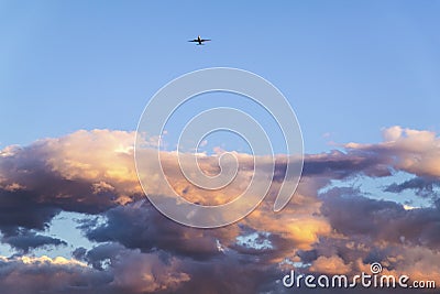 Aircraft beyond dense clouds Stock Photo