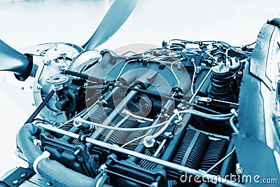 Aircraft engine detail. Piece of equipment of the aircraft engine closeup, blue colored Stock Photo