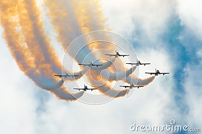 Aircraft fighter jets smoke the background of sky and sun Stock Photo