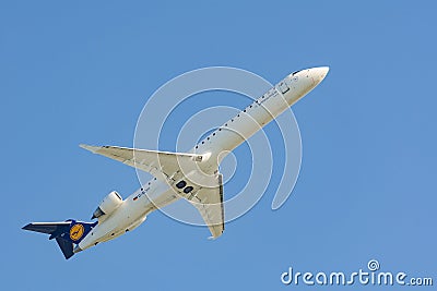 Aircraft of Lufthansa Regional CityLine airlines gains altitude Editorial Stock Photo