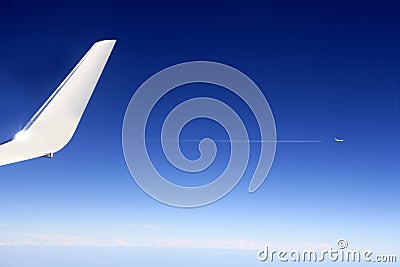 Aircraft wing detail flying high up Stock Photo