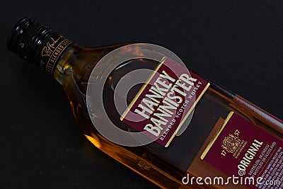 Hankey Bannister blended Scotch whisky bottle isolated on black background Editorial Stock Photo