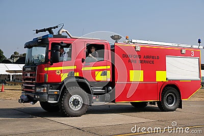 Airfield fire engine with roof mounted foam canon. Editorial Stock Photo