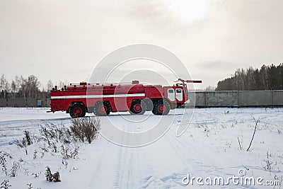 Airfield firetruck in the winter airport Stock Photo