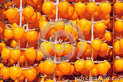 Airing persimmons Stock Photo