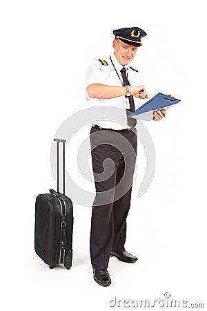 Airline pilot checking time Stock Photo