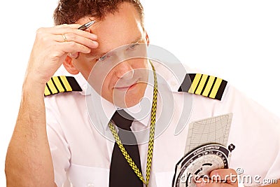 Airline pilot using flight computer Stock Photo