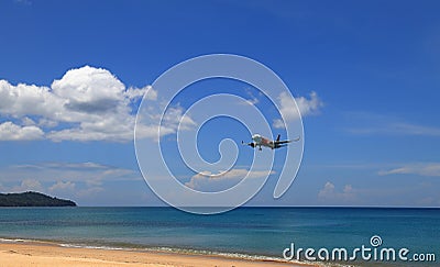 Airliner or Passenger plane Air Asia Airbus A320 landing to airport next to the beach. Editorial Stock Photo