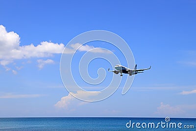 Airliner or Passenger plane Indigo Airbus A320 neo landing to airport next to the beach. Editorial Stock Photo