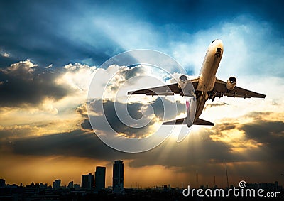 Airpland take off at sunset evening. Business airline concept,Travel airline concept. Stock Photo