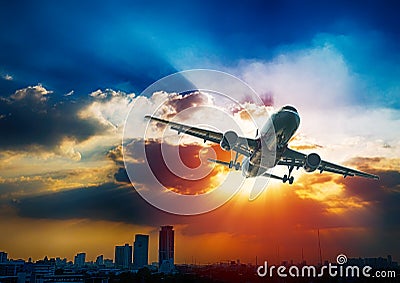 Airpland take off at sunset evening. Business airline concept,Travel airline concept. Stock Photo