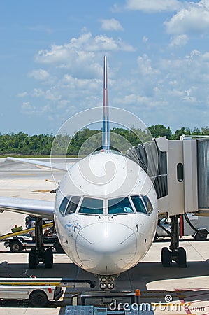 Airplane at airport gate Stock Photo