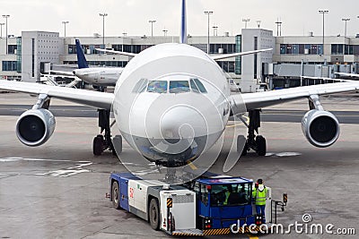 An airplane at airport on tarmac Stock Photo