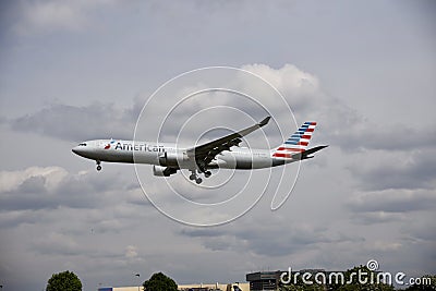 Airplane of American airlines in the sky Editorial Stock Photo