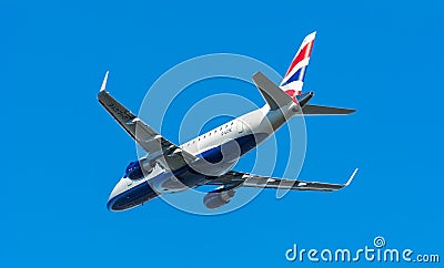 Airplane British Airways CityFlyer G-LCYE Embraer ERJ-170 is taking off at Schiphol airport. Editorial Stock Photo