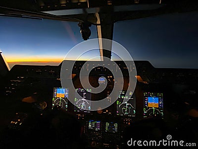 Airplane cockpit, Inflight during night time Editorial Stock Photo