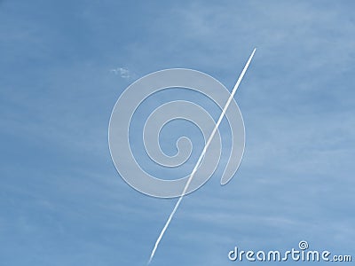 Airplane and Condensation trail Stock Photo