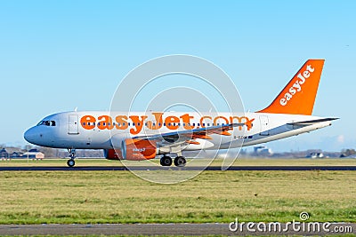 Airplane from easyJet G-EZAK Airbus A319-100 is taking off at Schiphol airport. Editorial Stock Photo