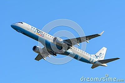 Airplane Flybe G-FBEG Embraer ERJ-195 is taking off at Schiphol airport. Editorial Stock Photo