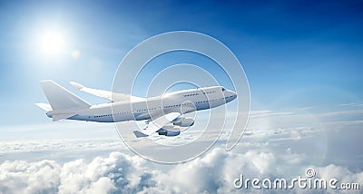 Airplane flying above clouds Stock Photo