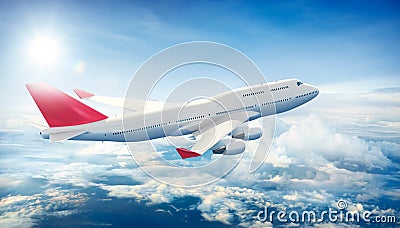 Airplane flying above clouds Stock Photo