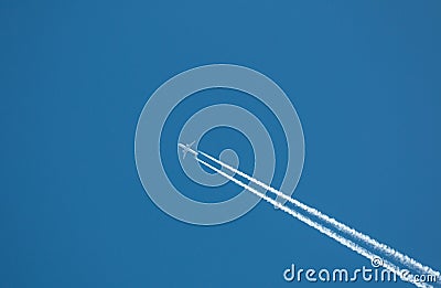 Airplane flying at high altitude Stock Photo