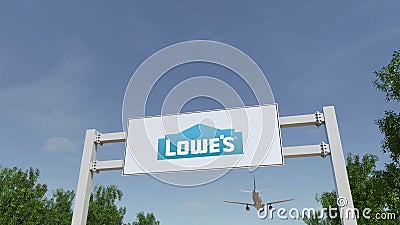 Airplane flying over advertising billboard with Lowe`s logo. Editorial 3D rendering Editorial Stock Photo