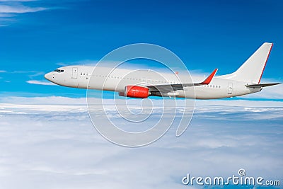 Airplane flying in the sky Stock Photo