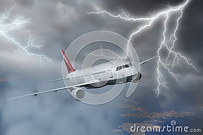 Airplane flying in storm Stock Photo