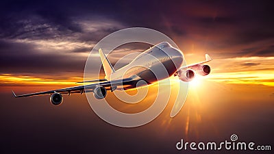 Airplane flying during sunset Stock Photo