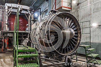 Airplane gas turbine engine detail in hangar Stock Photo