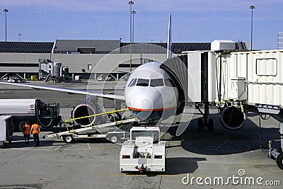 Airplane and Jetway Stock Photo