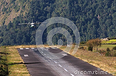 Airplane landing Stock Photo