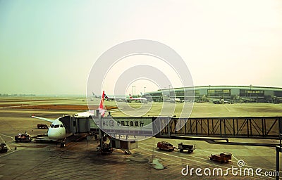 Airplane loading and ready starting to fly Editorial Stock Photo