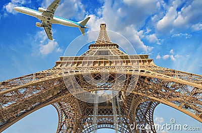 Airplane over Paris, France. Tourism and vacation concept Stock Photo