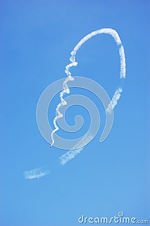 Airplane Performing Spiraling Stunt Sequence Stock Photo