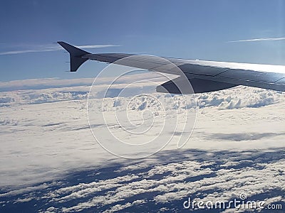 Airplane photo above the clouds Stock Photo