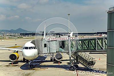 Airplane preparation to fly in El Prat International airport in Barcelona Editorial Stock Photo