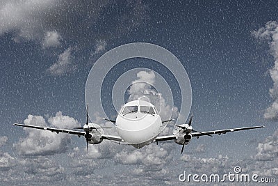 Airplane in the rain Stock Photo