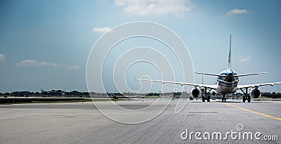 Airplane ready to take off from runway Editorial Stock Photo