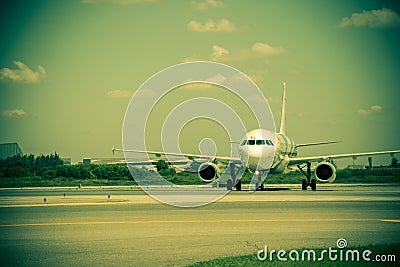 Airplane ready to take off from runway Stock Photo
