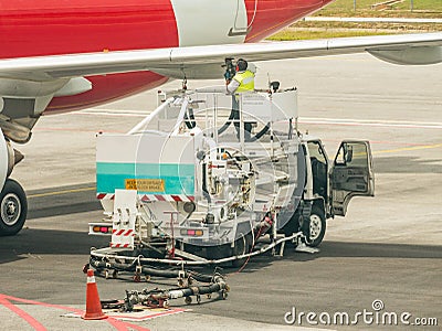 Airplane Refueling After Landing at the Airport Editorial Stock Photo